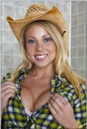 Blond teen babe in a cowboy hat Shawna Lenee goes nude in the shower on dochick.com