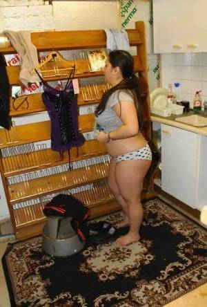 Fat amateur Kimberly Scott changes into lingerie inside a XXX store on dochick.com