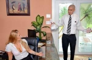 Clothed office worker unveiling big tits while fucking co-worker on dochick.com