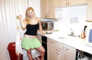Fuckable blonde amateur Roxy Lovette slowly getting rid of her clothes on dochick.com