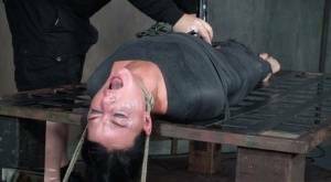 London River is mummified and tied down before being throat fucked in dungeon on dochick.com