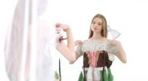 Young beauty Adel Bye dresses in an Oktoberfest outfit to greet her boyfriend on dochick.com