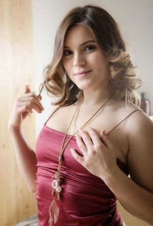 Sexy teen girl Evelina Darling wets her vibrator before masturbating on dochick.com