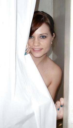 Sweet european amateur posing for a homemade photo in the shower on dochick.com