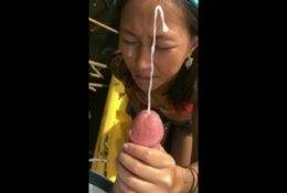 Tiny Asian gets covered in Cum on dochick.com