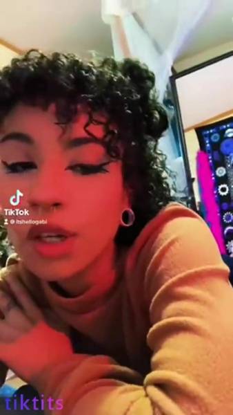 Curly girl flashes her nake ass in the mirror on Tiktok adult on dochick.com