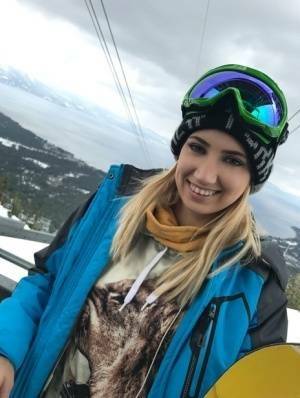 Clothed teens Kristen Scott & Sierra Nicole don ski masks while snowboarding on dochick.com