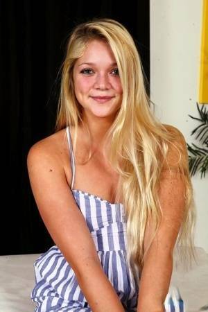Young blonde Jessie Andrews is all aglow after a fuck and open mouth facial on dochick.com