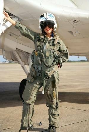 Sizzling mature babe Roni strips from military air force uniform on dochick.com