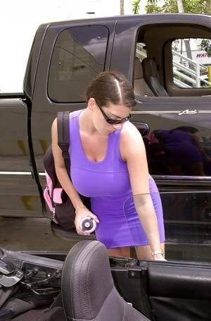Linsey Dawn McKenzie shows her upskirt area in the car. on dochick.com