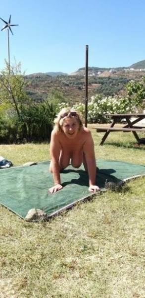 Mature amateur sports a creampie after sex atop a picnic table on dochick.com