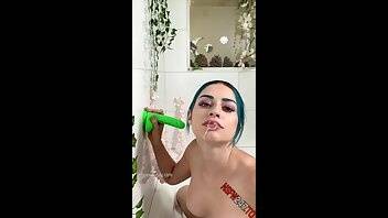 Jewelz Blu sucking a neon green dildo in the tub onlyfans porn videos on dochick.com