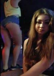 Two girls teasing in the club on dochick.com