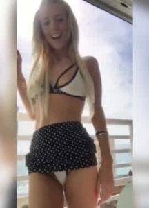 Hot blonde on vacation teasing in bikini on dochick.com