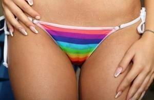 Flexible teen Tiffany Tatum removes a wet bikini before pleasuring her pussy on dochick.com