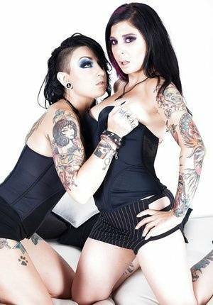 Goth models play with their tatted tight bodies and pussies on dochick.com