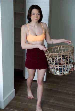 Young brunette Riley Jean makes her nude debut on a bed during laundry day on dochick.com