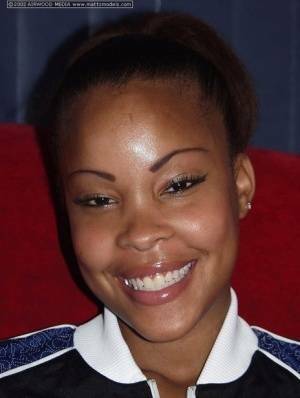 Black amateur Candice flashes a nice smile before baring her great body on dochick.com