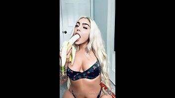 Emily Rinaudo striping teasing and sucking off banana in a black lingerie onlyfans porn videos on dochick.com