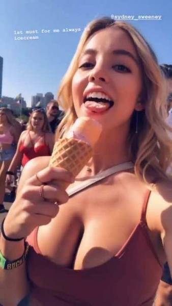 Sydney Sweeney Being Tease by Showing her Licking Skills. She's Drop Dead Gorgeous, her Incredible Rack is Just Unavoidable. on dochick.com