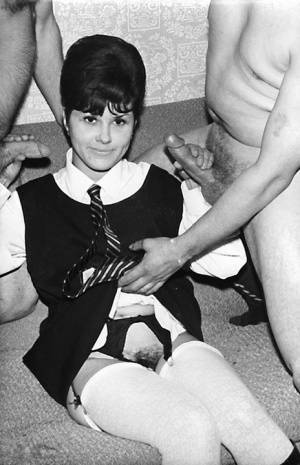Small titted vintage schoolgirl removes her uniform for a big cock threesome on dochick.com
