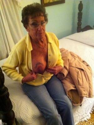 Dirty amateur granny shows her sexy naked body and kisses a young stud on dochick.com
