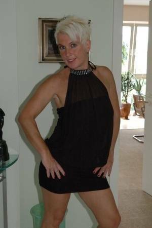 Blonde mature Claudia stipping out of a black dressAmateur,Mature,Stripping on dochick.com