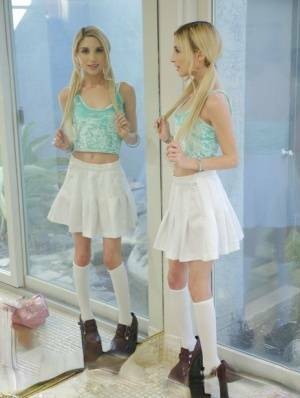 Sweet blonde girl Piper Perri removes her white pretties and skirt on dochick.com